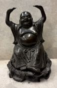 An early 20th Century bronze laughing Buddha.