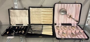 Three cased sets of plated flatware.