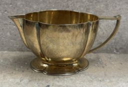 A silver gilt jus. London 1930. (Falcon mark). By Henry George Murphy. Approx.187 grams. Est. £400 -