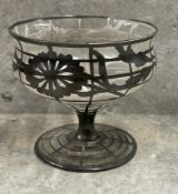 A glass bowl with silver inlaid decoration. Est. £60 - £80.