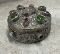 An early rare 20th Century jewelled Egyptian silver snuff box with lift off cover. Marked to base.