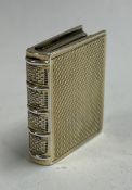 A William IV silver gilt engine turned vinaigrette in the form of a book. London 1830. By TD.