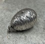 An 18th Century silver egg shaped box with screw top cover and control mark. Approx. 25 grams.