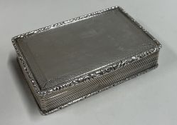 A large Victorian silver engine turned snuff box. Birmingham 1849. By Francis Clark. Approx. 149