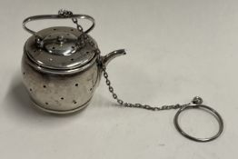 An American Sterling silver tea infuser on suspension c