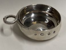 A silver wine taster. London 1979. By Richard Comyns. Approx. 76 grams. Est. £150 - £200.