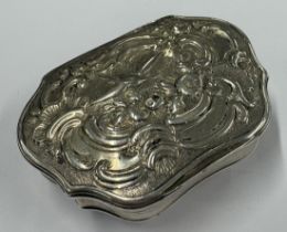 An 18th Century George II silver snuff box with embossed decoration to cover. Maker's mark only to