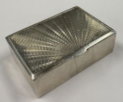 An engine-turned American silver double stamp case, marked Sterling. Approx. 89 grams. Est. £