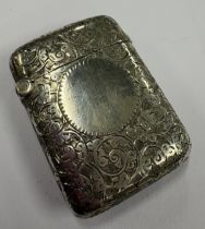 An Edwardian silver vesta case with engraved decoration. Birmingham 1907. By Joseph Gloster Ltd.