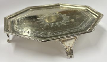A crisp 18th Century silver teapot stand with bright-cut decoration. London 1796. Approx. 136 grams.