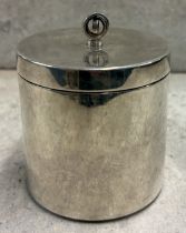 A modernistic Britannia Standard silver tea caddy with spinning-top finial to lift-off cover. London