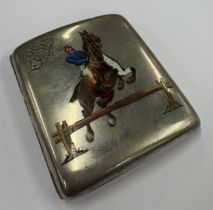 A novelty Continental silver and enamelled cigarette case depicting scene of horse and rider.