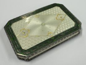 A Continental silver and enamelled snuff box with green and white decoration. Approx. 131 grams.