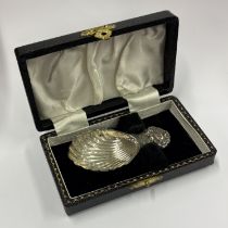 A silver caddy spoon contained within fitted box. Birmingham 1994. By JR. Approx. 21 grams. Est. £50