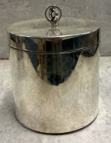 A large modernistic Britannia Standard silver tea caddy with spinning-top finial to lift-off