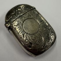 A Victorian silver vesta case with engraved decoration. Birmingham 1897. Approx. 17 grams. Est. £