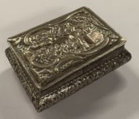 An Antique Continental silver snuff box with embossed decoration, marked to rim. Approx. 99 grams.