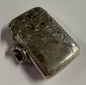 A rectangular silver vesta case with engraved decoration. Birmingham. By RC. Approx. 15 grams.