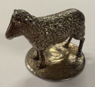 A heavy silver figure of a sheep. Approx. 81 grams. Est. £150 - £200.