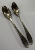 A pair of 18th Century Provincial silver spoons, marked LK to reverse. Approx. 20 grams. Est. £