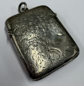 A large silver vesta case engraved with leaves. Birmingham. Approx. 28 grams. Est. £40 - £60.