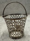 An 18th Century George III silver swing-handled basket with pieced decoration. London 1769. By