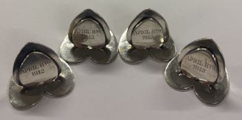 CHESTER: A set of four heart-shaped silver menu holders. 1910. By Sampson Mordan & Co. Approx. 90