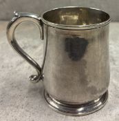 A baluster-shaped 18th Century George I silver tankard. London 1729. By Richard Bayley. Approx.