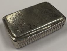 A George III silver snuff box with hinged cover. Birmingham 1820. By TB. Approx. 26 grams. Est. £