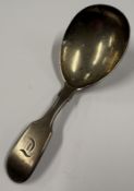 A William IV silver caddy spoon. London 1837. Approx. 20 grams. Est. £40 - £60.