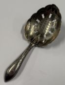 A crisp Georgian silver caddy spoon with bright-cut decoration to bowl. London 1831. Approx. 7