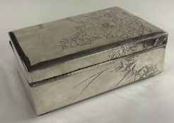 A Japanese silver and mixed metals cigar box, bearing Pure Silver character marks to base. Approx.