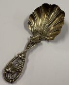 A Victorian silver caddy spoon with grape and vine decoration. Birmingham 1859. By George Unite.