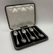 A cased set of six silver teaspoons with shell decoration. Sheffield 1926. By Cooper Brothers & Sons