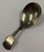 A George III silver caddy spoon. London 1805. By JS. Approx. 12 grams. Est. £50 - £80.