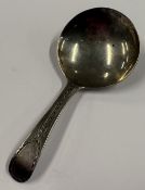 A 19th Century George III silver caddy spoon with bright-cut decoration to handle. London 1819.