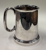 An unusual silver pint mug with glass base. Birmingham 1939. By Clark & Sewell. Approx. 473 grams of
