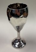 A silver trophy cup inscribed 'Motor Cycling Club Ltd'.