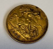A 1906 half sovereign gold coin.