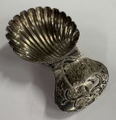 An 18th Century silver caddy spoon with bright-cut
