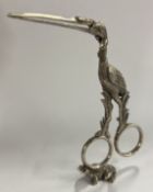 A pair of Victorian silver ice tongs in the form o