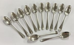A set of twelve 18th Century silver bottom marked