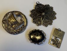 A filigree silver pendant etc.
