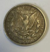 An American 1879 Carson City Dollar coin.