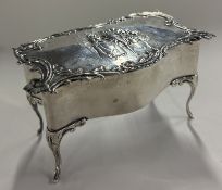 A large Art Nouveau silver jewellery box with embo