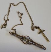 A 9 carat pearl brooch together with a cross.