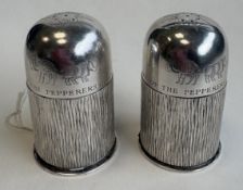 GERALD BENNEY: A pair of silver peppers with bark