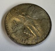 A Mexican 999 silver one ounce coin. Approx. 31 gr
