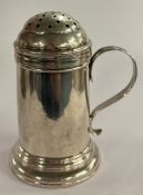 An 18th Century George I silver kitchen pepper. Lo