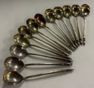 A set of twelve Russian silver and niello spoons,